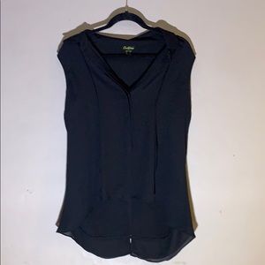 Sleeveless black blouse